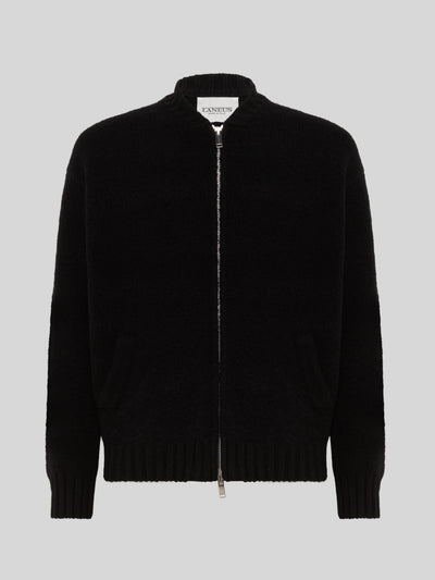 BOMBER JACKET OVER KNITWEAR