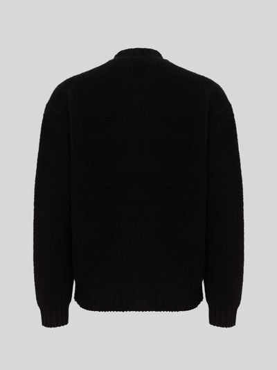 BOMBER JACKET OVER KNITWEAR